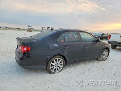 Trzecie zdjęcie samochodu z tyłu: 2010 VOLKSWAGEN JETTA VIN:3VWRA7AJ4AM024382 - miniatura