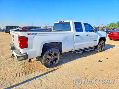 Trzecie zdjęcie samochodu z tyłu: 2017 CHEVROLET SILVERADO K1500 LT VIN:1GCVKREC3HZ364816 - miniatura