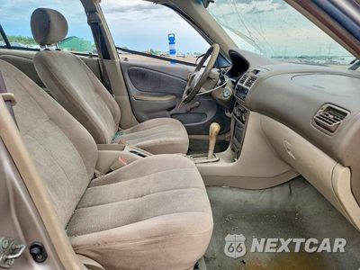 Zdjęcie 7 z 12 samochodu: 2002 TOYOTA COROLLA CE VIN:1NXBR12E22Z573650 - miniatura