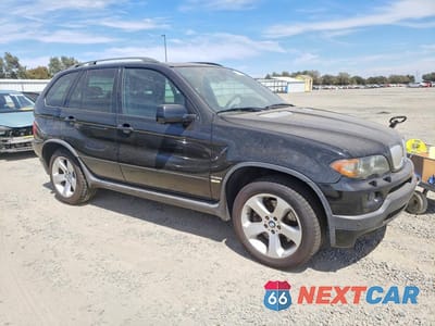 Czwarte zdjęcie samochodu z boku: 2004 BMW X5 4.8IS VIN:5UXFA93524LE81412 - miniatura
