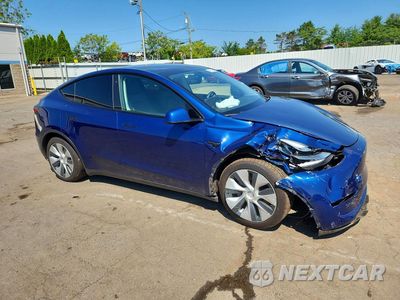 Czwarte zdjęcie samochodu z boku: 2022 TESLA MODEL Y VIN:7SAYGDEE0NF401814 - miniatura