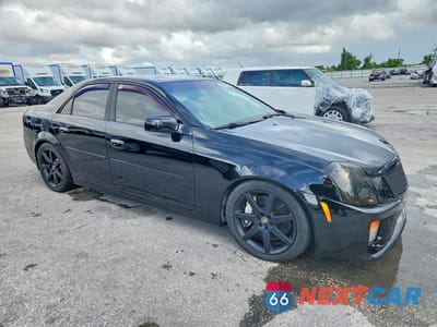 Czwarte zdjęcie samochodu z boku: 2004 CADILLAC CTS-V VIN:1G6DN57S140158346 - miniatura