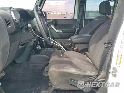 Zdjęcie 7 z 14 samochodu: 2013 JEEP WRANGLER UNLIMITED SAHARA VIN:1C4BJWEG9DL668110 - miniatura