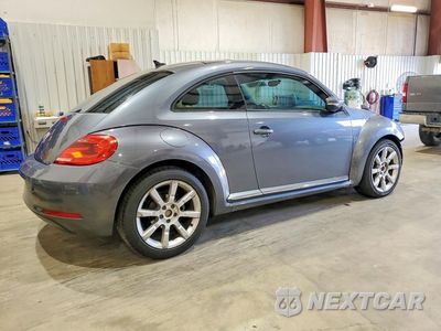 Trzecie zdjęcie samochodu z tyłu: 2014 VOLKSWAGEN BEETLE BEETLE, BEETLE BLACK TURBO, BEETLE WHITETURBO VIN:3VWJX7AT1EM630872 - miniatura
