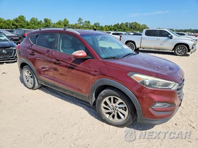 Czwarte zdjęcie samochodu z boku: 2016 HYUNDAI TUCSON SE VIN:KM8J33A46GU166469 - miniatura
