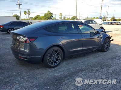 Trzecie zdjęcie samochodu z tyłu: 2021 TESLA MODEL 3 VIN:5YJ3E1EA6MF853578 - miniatura