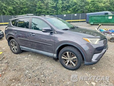 Czwarte zdjęcie samochodu z boku: 2016 TOYOTA RAV4 XLE VIN:2T3RFREV8GW440701 - miniatura