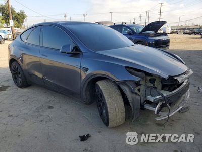 Czwarte zdjęcie samochodu z boku: 2022 TESLA MODEL Y VIN:7SAYGDEE3NF467550 - miniatura