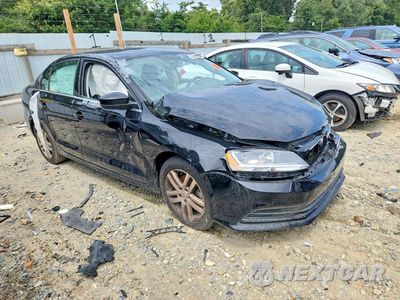 Czwarte zdjęcie samochodu z boku: 2017 VOLKSWAGEN JETTA S VIN:3VW2B7AJ1HM381012 - miniatura