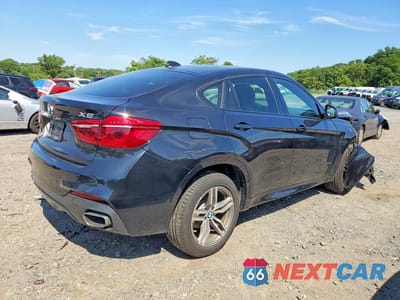 Trzecie zdjęcie samochodu z tyłu: 2018 BMW X6 XDRIVE35I VIN:5UXKU2C52J0X51570 - miniatura