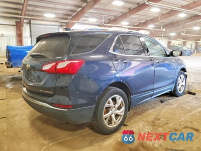 Trzecie zdjęcie samochodu z tyłu: 2021 CHEVROLET EQUINOX PREMIER VIN:3GNAXXEVXMS110217 - miniatura