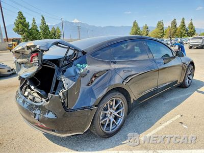 Trzecie zdjęcie samochodu z tyłu: 2022 TESLA MODEL 3 VIN:5YJ3E1EA6NF287553 - miniatura