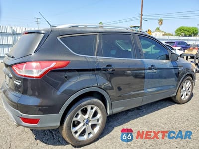 Trzecie zdjęcie samochodu z tyłu: 2016 FORD ESCAPE TITANIUM VIN:1FMCU0JX0GUC43917 - miniatura