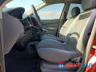 Zdjęcie 7 z 12 samochodu: 2004 FORD FOCUS LX VIN:1FAFP33P24W197357 - miniatura