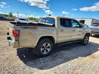 Trzecie zdjęcie samochodu z tyłu: 2019 TOYOTA TACOMA TRD SPORT VIN:3TMCZ5AN1KM259557 - miniatura
