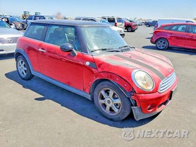 Czwarte zdjęcie samochodu z boku: 2009 MINI COOPER VIN:WMWMF33569TW79337 - miniatura