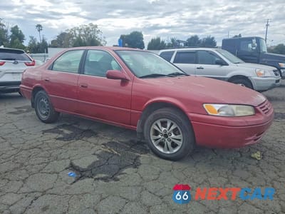 Czwarte zdjęcie samochodu z boku: 1998 TOYOTA CAMRY LE V6 VIN:JT2BF22K3W0144550 - miniatura