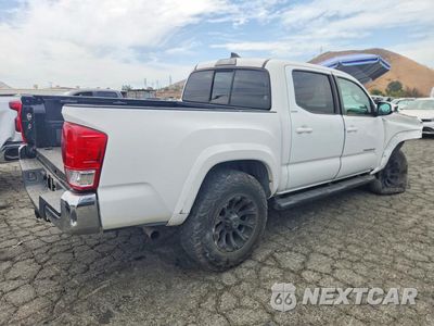 Trzecie zdjęcie samochodu z tyłu: 2017 TOYOTA TACOMA SR5 V6 VIN:3TMAZ5CN9HM048619 - miniatura