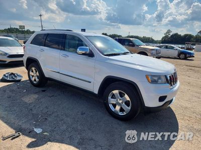 Czwarte zdjęcie samochodu z boku: 2013 JEEP GRAND CHEROKEE LIMITED VIN:1C4RJFBG2DC551830 - miniatura