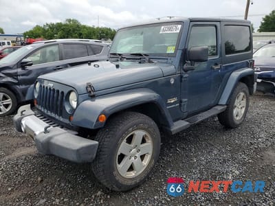 2008 JEEP WRANGLER SAHARA 1J4FA54158L567140 - główne zdjęcie licytacji z USA - miniatura
