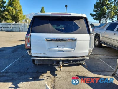 Zdjęcie 6 z 14 samochodu: 2017 GMC YUKON XL DENALI VIN:1GKS2HKJ2HR345176 - miniatura