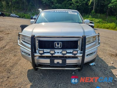 Piąte zdjęcie samochodu w środku: 2007 HONDA RIDGELINE RTL VIN:2HJYK16557H505944 - miniatura