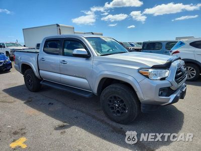 Czwarte zdjęcie samochodu z boku: 2019 TOYOTA TACOMA SR5 V6 VIN:3TMAZ5CN6KM107584 - miniatura