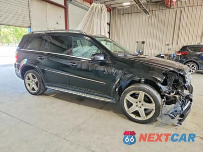 Czwarte zdjęcie samochodu z boku: 2011 MERCEDES-BENZ GL 550 4MATIC VIN:4JGBF8GE2BA660119 - miniatura