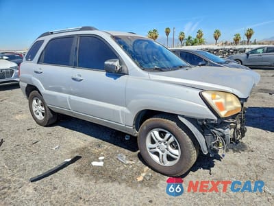 Czwarte zdjęcie samochodu z boku: 2005 KIA SPORTAGE LX VIN:KNDJF723357046620 - miniatura
