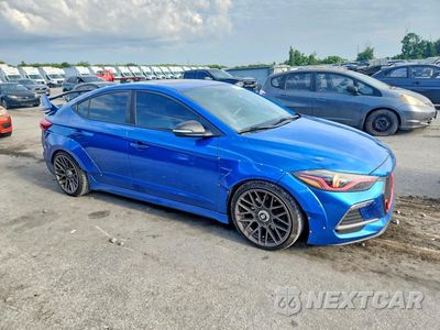 Czwarte zdjęcie samochodu z boku: 2018 HYUNDAI ELANTRA SPORT VIN:KMHD04LB4JU571874 - miniatura