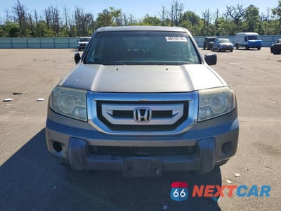 Piąte zdjęcie samochodu w środku: 2009 HONDA PILOT LX VIN:5FNYF48219B028743 - miniatura