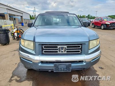 Piąte zdjęcie samochodu w środku: 2006 HONDA RIDGELINE RTL VIN:2HJYK16516H551690 - miniatura