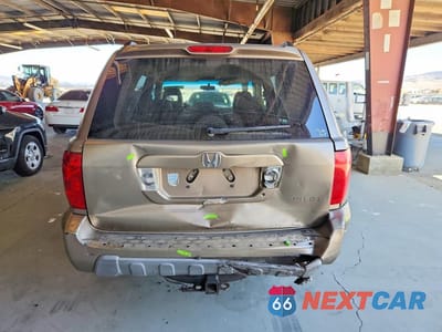 Zdjęcie 6 z 13 samochodu: 2004 HONDA PILOT EXL VIN:2HKYF18504H518707 - miniatura