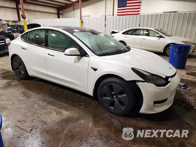 Czwarte zdjęcie samochodu z boku: 2021 TESLA MODEL 3 VIN:5YJ3E1EA5MF977499 - miniatura