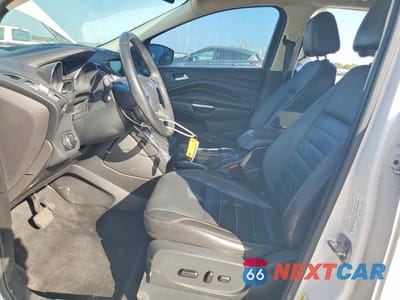 Zdjęcie 7 z 13 samochodu: 2014 FORD ESCAPE TITANIUM VIN:1FMCU0JX6EUC44471 - miniatura