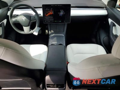 Zdjęcie 8 z 14 samochodu: 2022 TESLA MODEL Y VIN:7SAYGDEE7NF354099 - miniatura