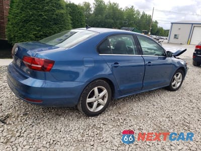 Trzecie zdjęcie samochodu z tyłu: 2017 VOLKSWAGEN JETTA SE VIN:3VWB67AJ4HM327109 - miniatura