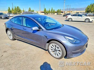 Czwarte zdjęcie samochodu z boku: 2022 TESLA MODEL 3 VIN:5YJ3E1EB5NF325864 - miniatura