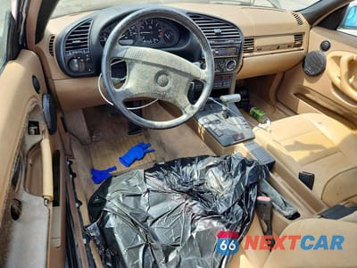 Zdjęcie 8 z 12 samochodu: 1994 BMW 325 IC AUTOMATIC VIN:WBABJ6326RJD32327 - miniatura