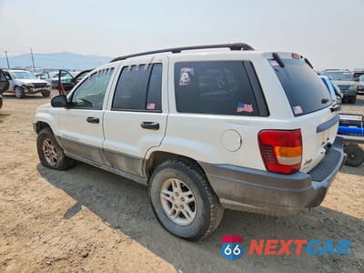 Drugie zdjęcie samochodu z przodu: 2003 JEEP GRAND CHEROKEE LAREDO VIN:1J4GW48S23C617407 - miniatura