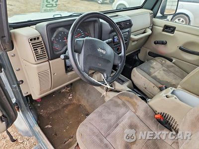 Zdjęcie 8 z 12 samochodu: 2004 JEEP WRANGLER / TJ SPORT VIN:1J4FA49S04P774646 - miniatura