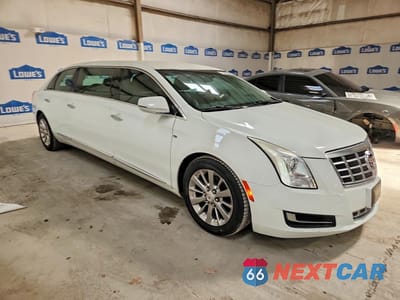 Czwarte zdjęcie samochodu z boku: 2014 CADILLAC XTS LIMOUSINE VIN:2GEXG6U37E9191731 - miniatura
