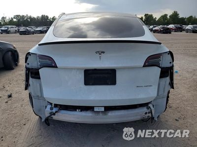 Zdjęcie 6 z 13 samochodu: 2023 TESLA MODEL Y VIN:7SAYGDEE6PA057180 - miniatura