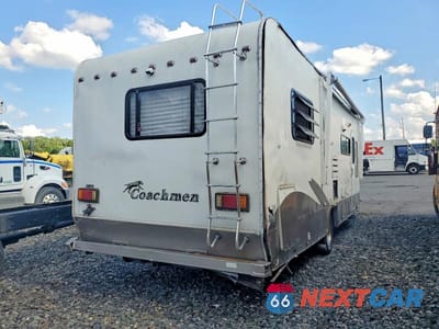 Czwarte zdjęcie samochodu z boku: 2004 FORD ECONOLINE E450 SUPER DUTY CUTAWAY VAN VIN:1FDXE45S04HB49769 - miniatura