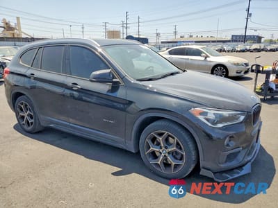 Czwarte zdjęcie samochodu z boku: 2016 BMW X1 XDRIVE28I VIN:WBXHT3C36GP884175 - miniatura