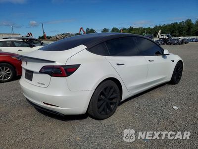 Trzecie zdjęcie samochodu z tyłu: 2019 TESLA MODEL 3 VIN:5YJ3E1EB2KF510613 - miniatura