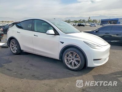 Czwarte zdjęcie samochodu z boku: 2021 TESLA MODEL Y VIN:5YJYGDEE0MF204198 - miniatura