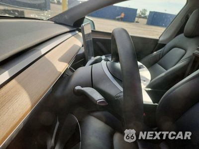 Zdjęcie 9 z 12 samochodu: 2023 TESLA MODEL Y VIN:7SAYGDEE7PA054532 - miniatura