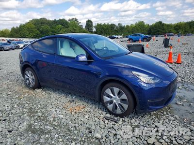 Czwarte zdjęcie samochodu z boku: 2022 TESLA MODEL Y VIN:7SAYGDEE3NF392395 - miniatura