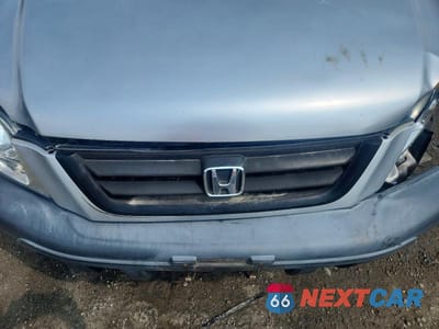 Zdjęcie 12 z 13 samochodu: 1998 HONDA CR-V LX VIN:JHLRD1845WC103708 - miniatura